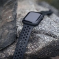 Preview: Apple Watch 4 5 6 7 SE TACTICAL Zulu Aramid Cover Carbon-schwarz liegend auf Stein Zubehör kaufen